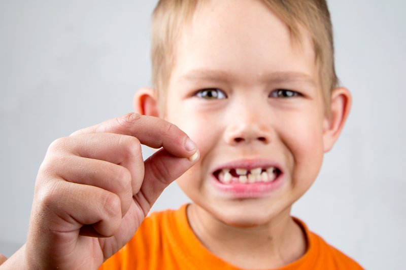 handle knocked out tooth in children